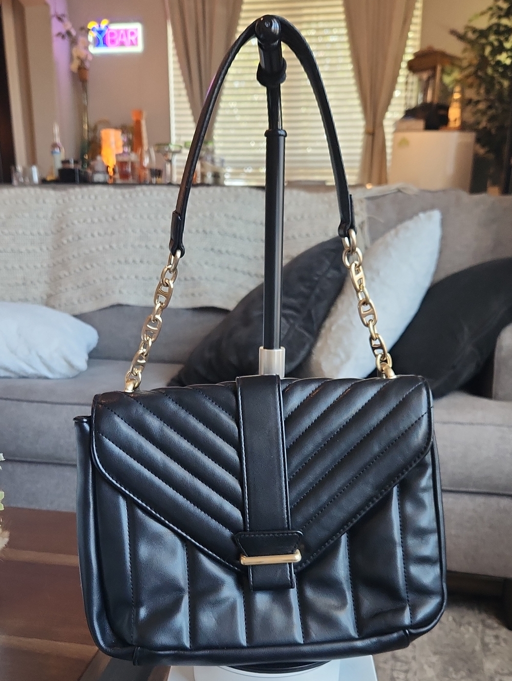 Black Quilted Shoulder Bag with Gold Chain Accent